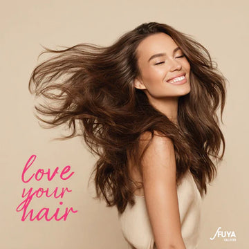 FUYA campaign photo with woman flipping hair and text “Love your hair” on beige background