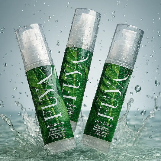 Three FUYA Hair Serum bottles standing in fresh water – symbolizing hydration and purity